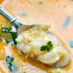 thai shrimp soup in a white bowl with text overlay