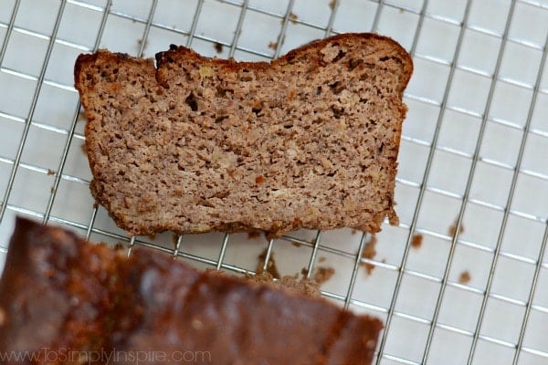 Gluten Free Banana Bread slice on a cooling rack.