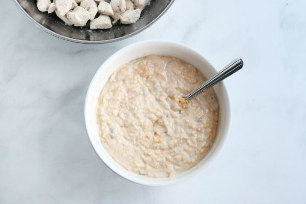 cheese and creamy soups mixed in a white bowl