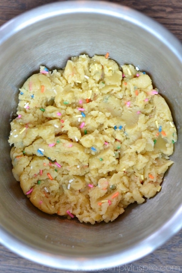 A bowl of cookie dough with sprinkles 