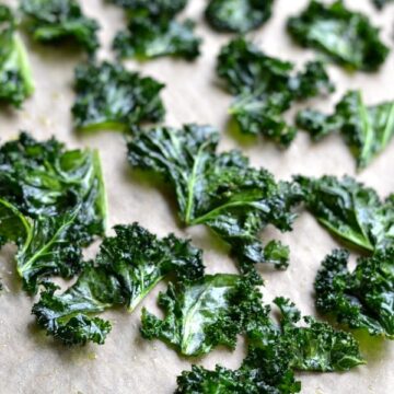 kale chips on parchment paper