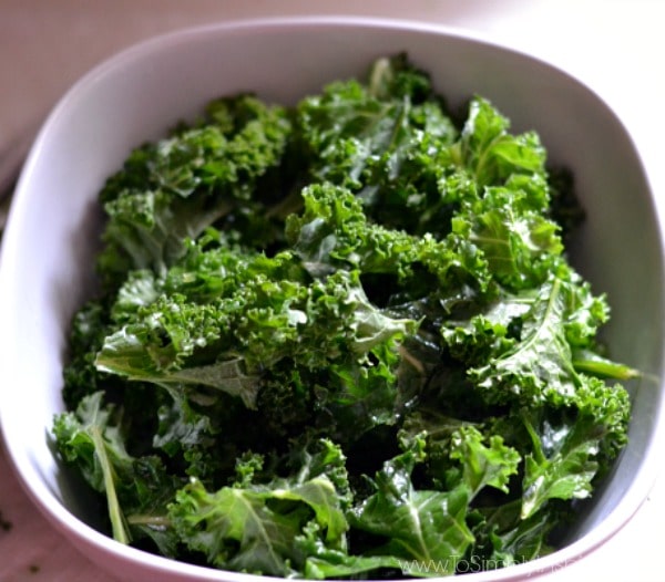 fresh kale in a white bowl