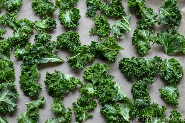uncooked Kale on parchment paper