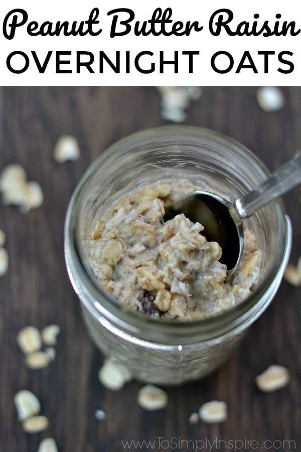 a mason jar with oatmeal and a spoon on a wood table