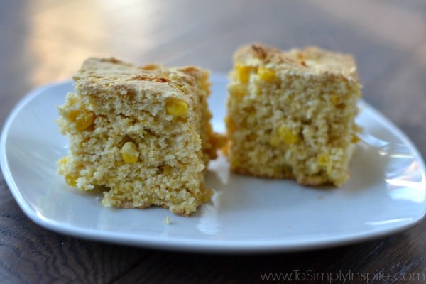 closeup of two pieces of cornbread on a plate