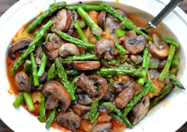 Spaghetti Squash Primavera recipe with asparagus and mushrooms in a white bowl 