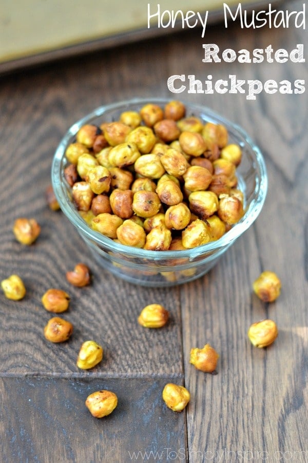 a glass bowl with honey mustard chickpeas with text overlay