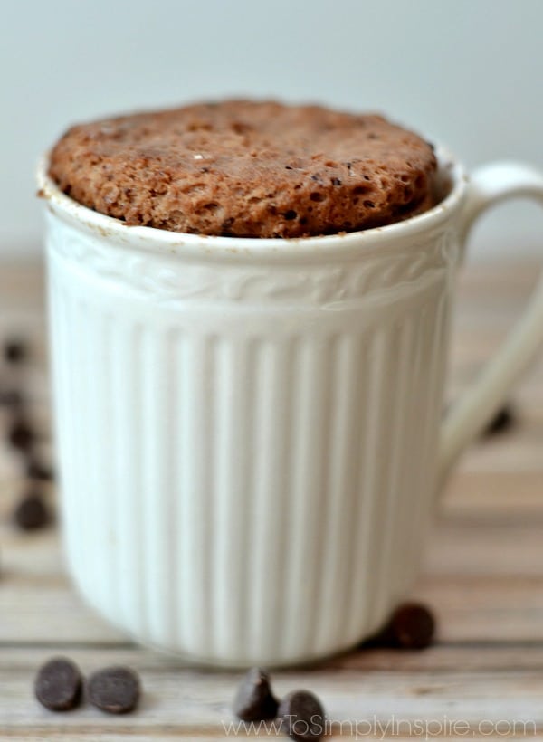 a white mug with a protein brownie cooked in the microwave