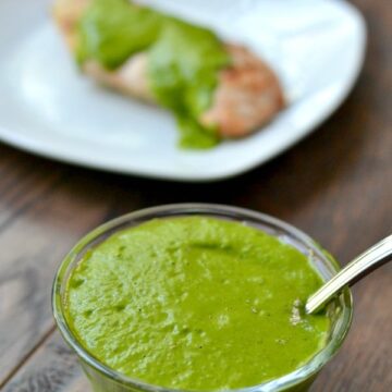 A close up of a bowl of green Chimichurri Sauce