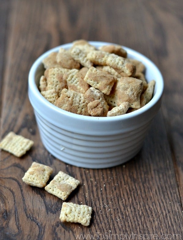 closeup of healthy muddy buddies snack made with chex mix cereal in a white bowl