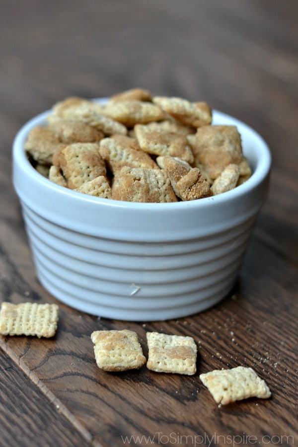 closeup of healthy muddy buddies snack made with chex mix cereal in a white bowl