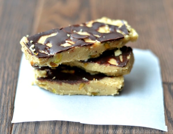 three halvah bars stacked on a piece of white parchment paper