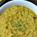 Indian spiced lentil dal recipe in a white bowl.