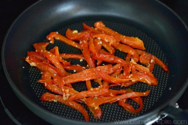 A pan filled with red pepper slices