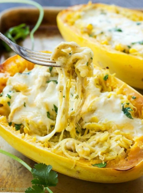 spaghetti squash on a fork covered in cheese