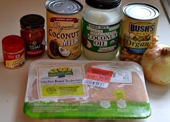 a package of chicken breasts with can of coconut milk, coconut oil, chickpeas and thai paste