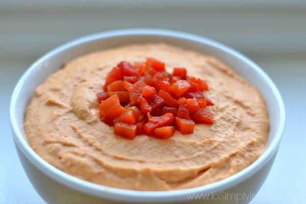 Roasted Red Pepper Hummus recipe in a white bowl