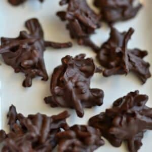 a group of Chocolate Haystacks recipe on a white plate.