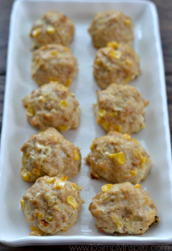 eight Turkey taco Balls on a white rectangle plate