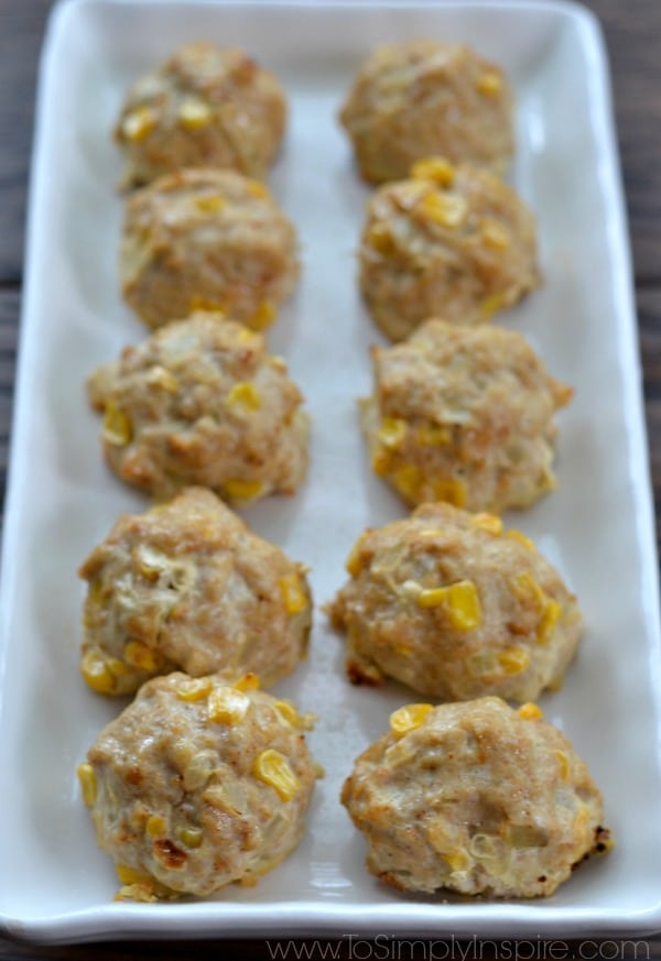 eight Turkey taco Balls on a white rectangle plate