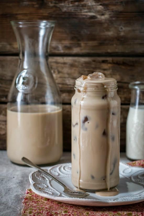 iced coffee in a glass with a carafe in the background 