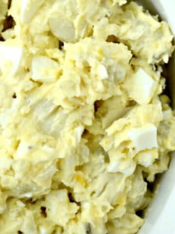 southern potato salad recipe in a white bowl