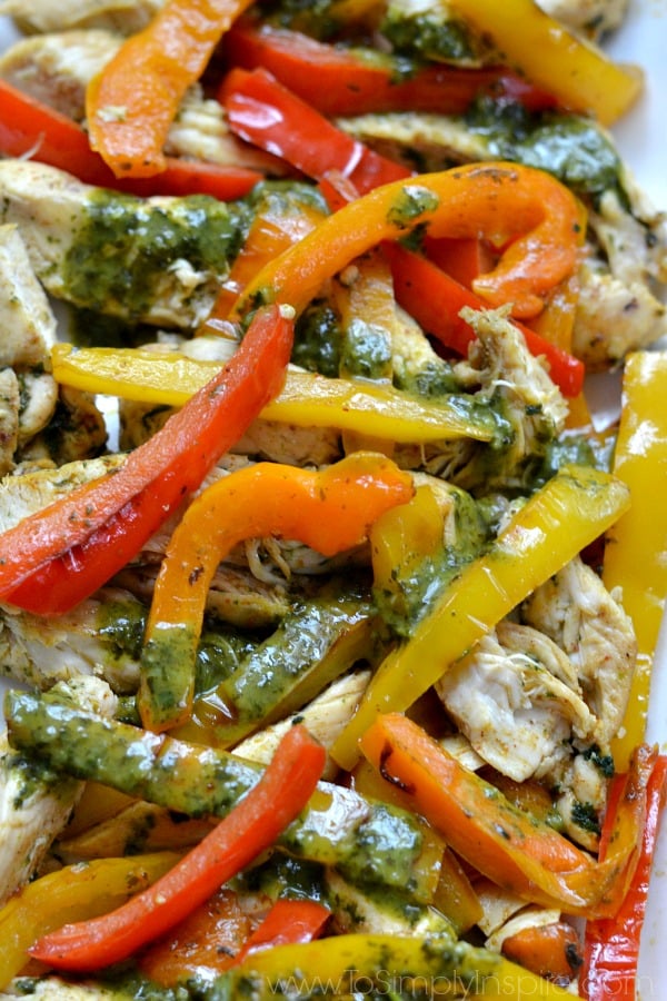 closeup of Cilantro Lime Chicken Fajitas recipe with red orange and yellow bell peppers