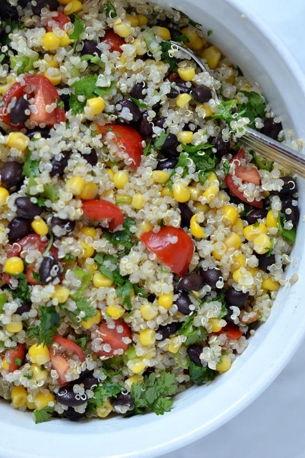 a closeup of Southwest quinoa salad recipe in a white bowl