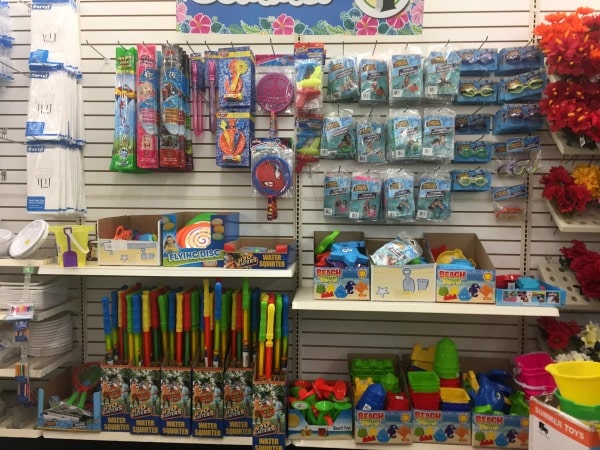 A store shelf filled with summer toys