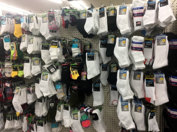 s store display of white socks