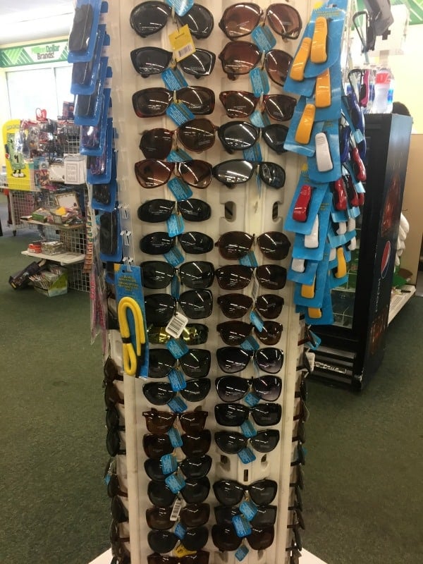 a Dollar Tree display of sunglasses