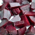 cooked beets on a white plate