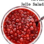 closeup of Raspberry Apple Jello Salad in a bowl with a white background