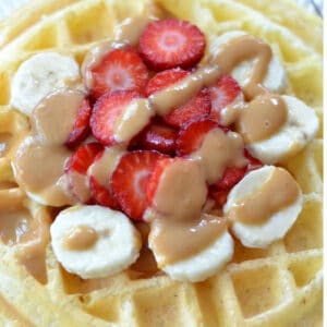 protein waffle recipe topped with strawberries and bananas