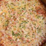 Overhead view of Mexican Cauliflower Rice Casserole in a stainless steel pan