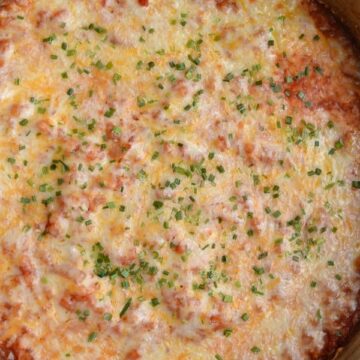 Overhead view of Mexican Cauliflower Rice Casserole in a stainless steel pan