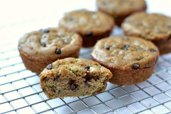 6 gluten free zucchini muffins on a wire cooling rack