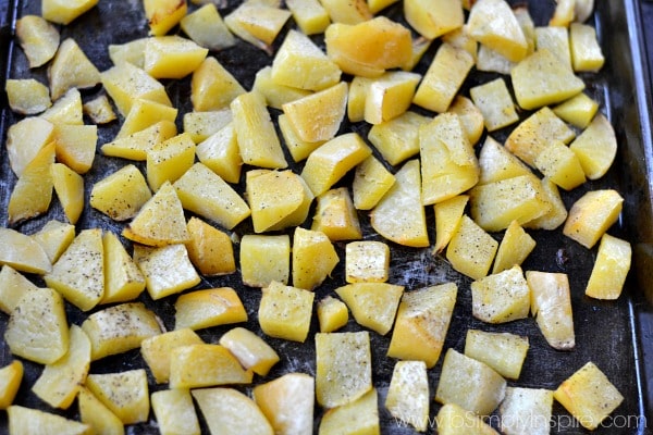 Roasted turnips cubes on a baking sheet