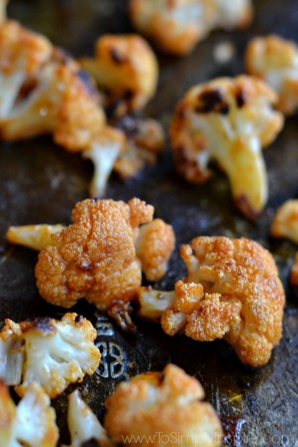 closeup of Buffalo Cauliflower recipe on a baking sheet