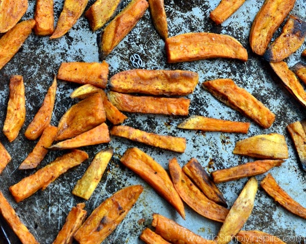 oven baked sweet potato fries on a baking sheet