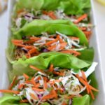 three Lemon Herb Chicken Lettuce Wraps with Citrus Slaw