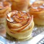 a tray of apple rose puff pastries