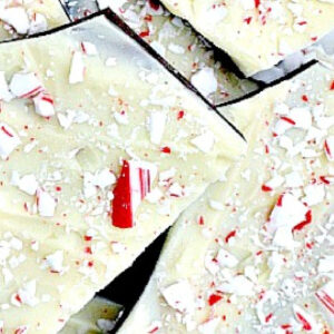 several pieces of peppermint bark with crushed peppermints on top