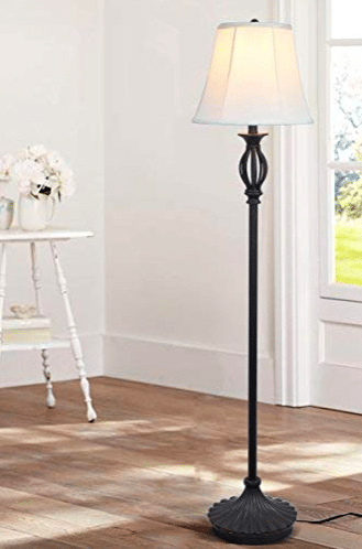 A black floor lamp in a room