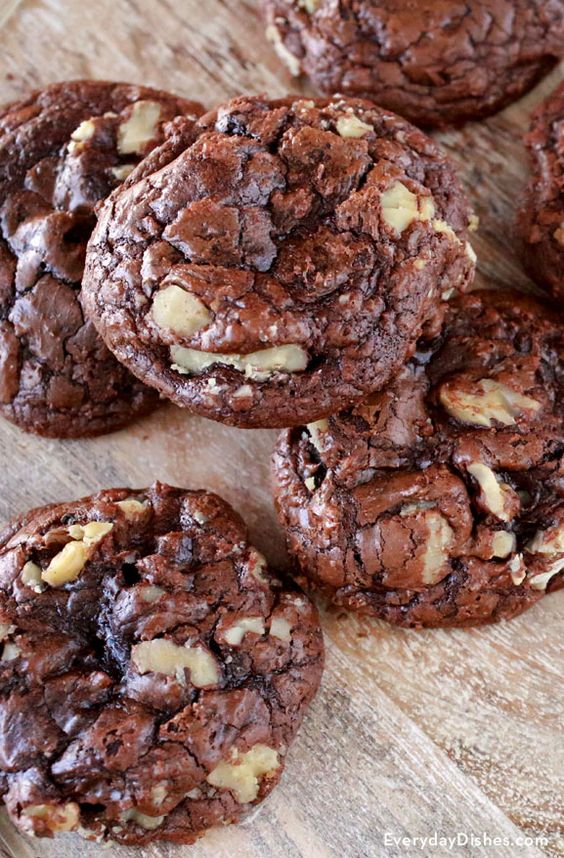 A close up of 4 Chocolate and Nut cookies