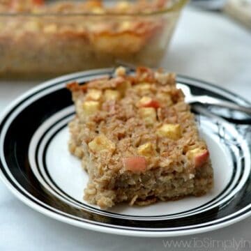 slice of baked oatmeal on a black rimmed plate