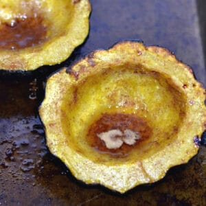 cooked acorn squash with brown sugar