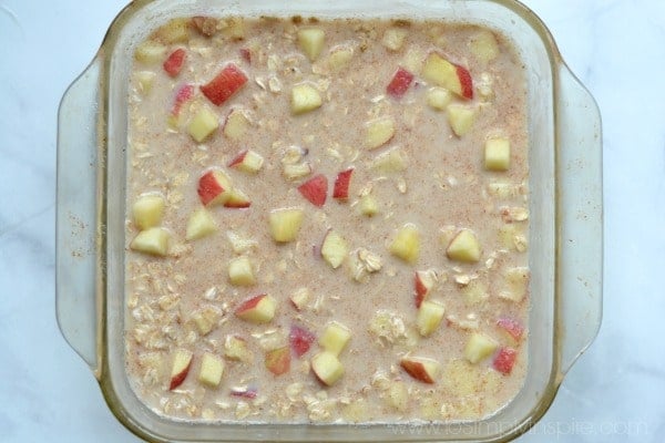 uncooked baked oatmeal ingredients in a baking dish