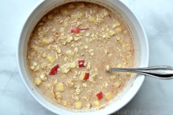 baked oatmeal ingredients mixed together in a bowl