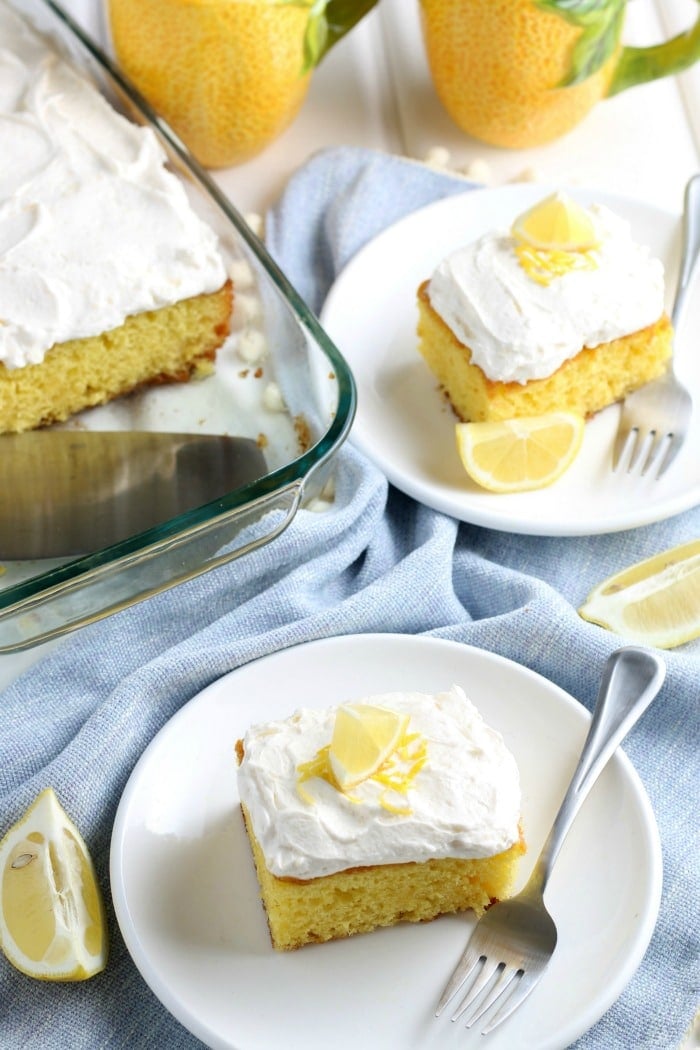 A plate of lemon cake on a table and Lemon